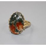 A 9ct. gold moss agate dress ring size O.