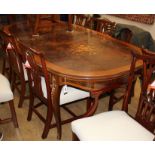 A Louis XVI style walnut and marquetry extending dining table 300cm extended
