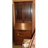 An Edwardian mahogany bureau bookcase (top associated) W.78cm