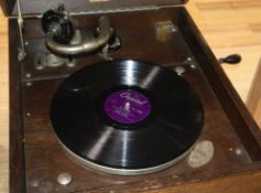 An HMV oak tabletop wind-up gramophone