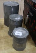 Two Chinese Swatow pewter cylindrical tea canisters and covers and another smaller canister, the