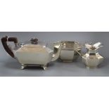 A George VI silver octagonal shaped teapot, Sheffield 1938, gross 22oz. and a silver sugar bowl with
