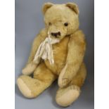 An English 1950's bear, 28in. replaced pads and nose stitching, some overall wear