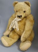 An English 1950's bear, 28in. replaced pads and nose stitching, some overall wear