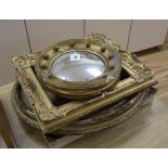 A small gilt convex mirror, two gilt frames and another (4)