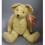 An early English teddy, 24in, excellent condition with original clear glass eyes and paw pads