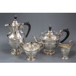 A late Victorian fluted four piece silver tea set, Sheffield 1893 (teapot marks rubbed and