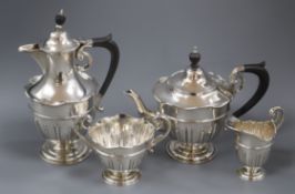 A late Victorian fluted four piece silver tea set, Sheffield 1893 (teapot marks rubbed and