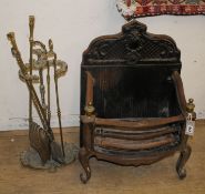 A cast iron serpentine fire grate and implements Grate W.48cm