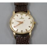A gentleman's late 1950's 9ct gold Lanco manual wind wrist watch, with baton and Arabic numerals, on