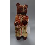 A clockwork dancing bear height 22cm