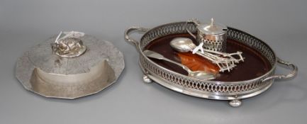 A Victorian silver butter dish, Russian spoon, silver mustard and shell inlaid oval tray, etc.