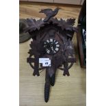A Black Forest cuckoo clock H.38cm