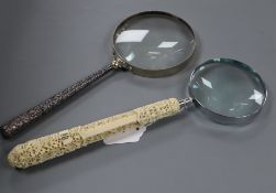 A Canton carved ivory parasol handle with later magnifier, 34cm, together with a white metal handled