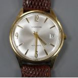 A gentleman's late 1960's 9ct gold automatic wrist watch, retailed by Garrard, with baton numerals