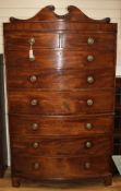 A Regency mahogany bow fronted chest on chest W.112cm