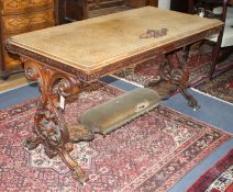 A Victorian carved walnut centre table W.142cm