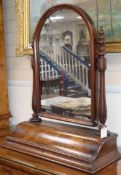 A Victorian walnut toilet mirror with hinged box base H.86cm