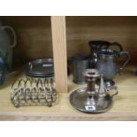 A Victorian silver plated chamberstick, pewter tankards, plates and a toast rack