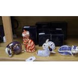 Twelve Royal Crown Derby paperweights, seven boxed, including Teddy Bear, Swan, Siamese Kitten,