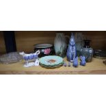 A quantity of Denby jugs, a Denby water bottle by Gilbert, a Doulton vase, a Victorian cow creamer