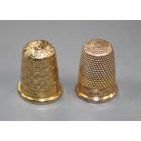 An early 20th century 15ct gold thimble, 5.3 grams and a 9ct gold thimble, by Charles Horner, 6