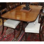 A Regency design mahogany twin pillar extending dining table W.190cm extended (one spare leaf)