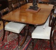 A Regency design mahogany twin pillar extending dining table W.190cm extended (one spare leaf)