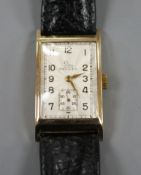 A gentleman's 1950's 9ct gold Record manual wind wrist watch, with rectangular starburst Arabic dial