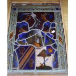 A 19th century stained glass panel in a bamboo frame 49 x 36cm