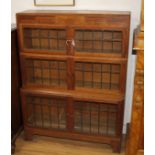 A pair of Minty, Oxford oak three-tier Globe Wernicke style bookcases W.89cm