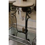 A wrought iron and marble top jardiniere stand H.62cm