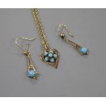 A pair of yellow metal and turquoise set drop earrings and a similar heart shaped pendant on a