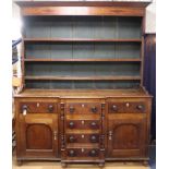 An early 19th century oak break front dresser W.172cm