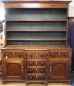 An early 19th century oak break front dresser W.172cm