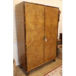 An Art Deco maple wardrobe W.122cm