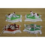 Four Staffordshire porcelain figures of three recumbent greyhounds and a poodle, c.1835-50, L. 9 -