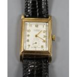 A gentleman's 1960's 9ct gold J.W. Benson manual wind wrist watch, with Arabic dial and subsidiary