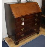 A George III oak bureau W.96cm