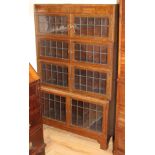 A Minty, Oxford oak four-tier Globe Wernicke style bookcase W.89cm