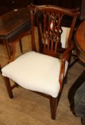 A set of ten Chippendale style mahogany dining chairs (two with arms)