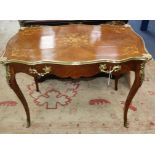 A Louis XVI style gilt metal mounted marquetry inlaid side table W.102cm