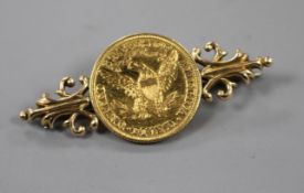 A United States 1893 5 dollar gold coin, now mounted as a brooch with 15ct mount, 49mm. Gross 10.5