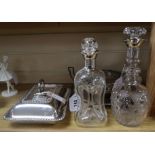 A silver-mounted dimple decanter, a similar cut glass decanter, a plated entree dish and two other