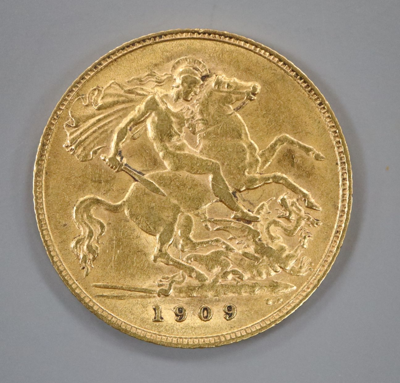 A 1909 gold half sovereign