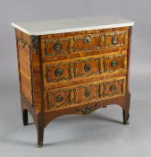 A 19th century French Louis XVI style ormolu mounted kingwood commode, with white marble top and