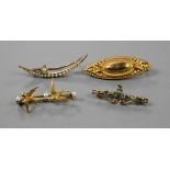 Four assorted early 20th century yellow metal and gem set brooches, including twin swallow and one