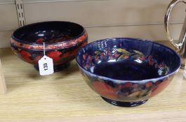A Moorcroft flambe 'Banded Pomegranate' footed bowl and a similar plain Pomegranate bowl, the former