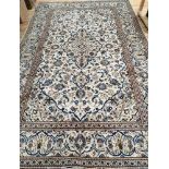 A Tabriz ivory ground carpet 300 x 200cm