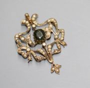 An Edwardian 9ct, green garnet and seed pearl set openwork scroll drop pendant, 47mm, gross 5.1